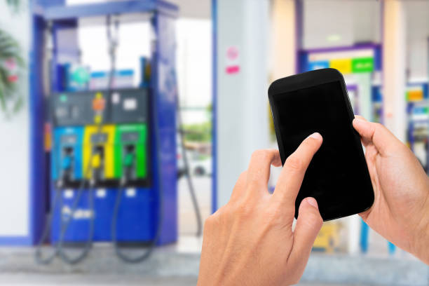 istock mobile wallet to pay online at gas station. 876612408