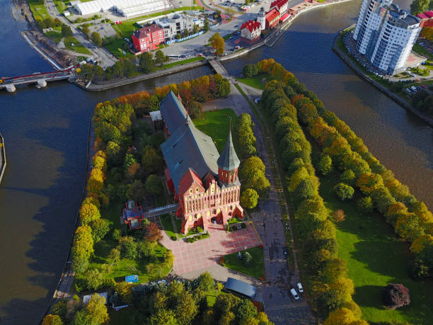 Aerial cityscape of Kaliningrad, Russia, Europe Aerial cityscape of Kaliningrad, Russia. Gothic cathedral in Kaliningrad city, formerly Koenigsberg, Germany. Beautiful view of Kant Island. The center of city in autumn. Birds eye panorama prussia stock pictures, royalty-free photos & images