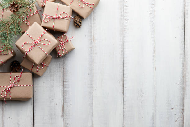 istock Christmas presents and gift boxes wrapped in kraft paper 876621582