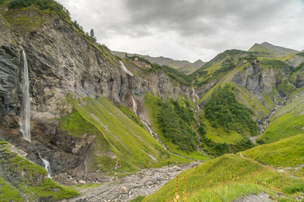 istock waterfall amphitheater in the Swiss Alps 876621932