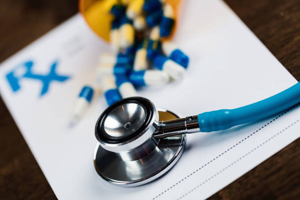 istock Prescription form with pills and stethoscope 876626632