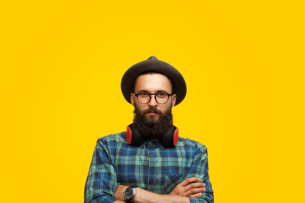 istock Hipster man with arms crossed 876629758