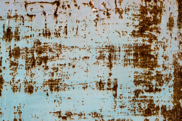 ひび割れ、錆古い金属製のドア。グランジは錆びた金属の背景です。ひびの入ったペイント テクスチャです。 - rust rusty old rotting ストックフォトと画像