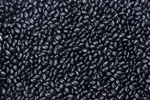 schwarze bohnen hintergrund. bean-muster - healthy eating macro vegetable farm stock-fotos und bilder