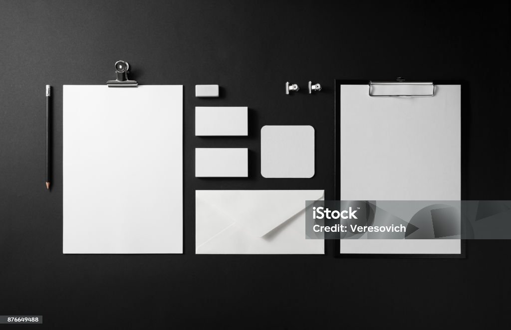 Blank corporate identity Photo of blank corporate identity. Stationery set on black paper background. Branding mockup. Top view. Office Supply Stock Photo