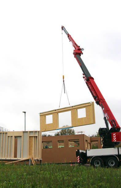 istock assembly of a prefabricated house 876652690