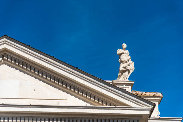 istock Statue in Saint Peter's cathedral facade 876652872