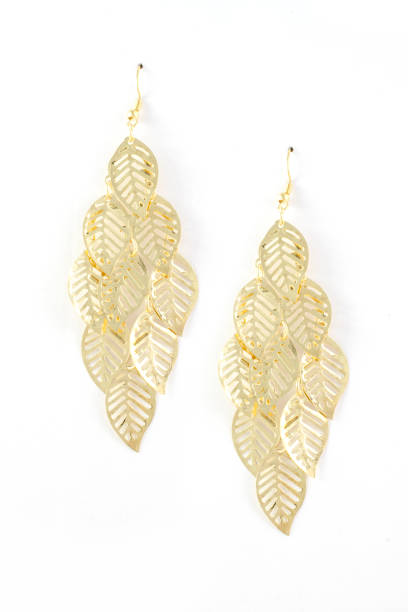 istock gold earrings with leaves isolated on white 876656318