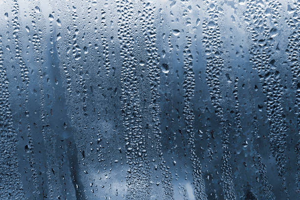 istock Natural water drops on window glass 876663212