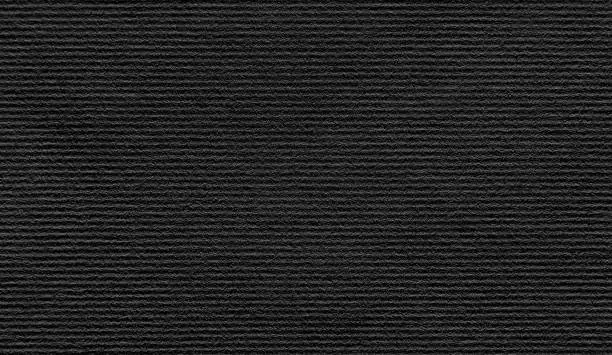 Black paper velvet texture with horizontal stripes. Can be used for presentation, paper texture, and background