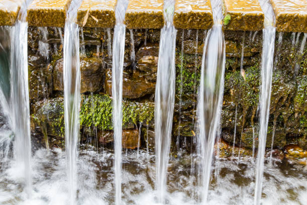 istock waterfalls in a Japanese garden 876670756