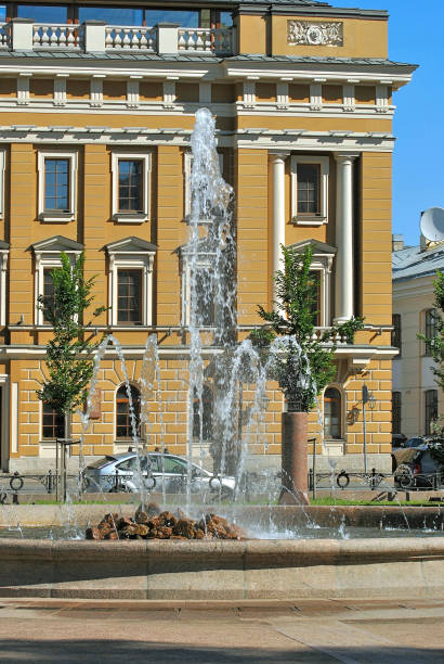 istock Fountain on the background of the building. 876671316