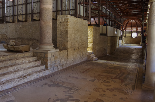 Piazza Armerina, Italy - September 11, 2017:  Mosaics in Villa Romana del Casale, Piazza Armerina, Sicilia, Italy, UNESCO World Heritage Site. Sicily, Italy