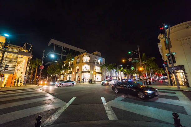 istock Rodeo Drive and Dayton way crossroad by night 876675738