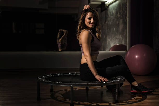 istock Trampoline workout in the gym 876675850