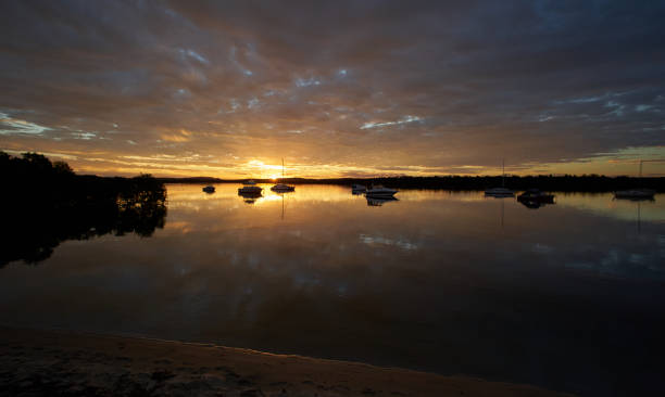 istock Hawks Nest, river sunset, wharf shore, Australia 876678760