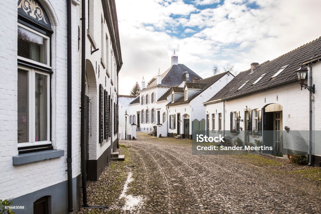 Historic city of Thorn known for its white houses Streets in the historic city of Thorn in Limburg, the Netherlands. Known for its white houses Thorn Stock Photo