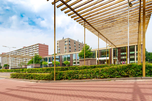 Elementry school with large apartment buildings on the background, no people stock photo