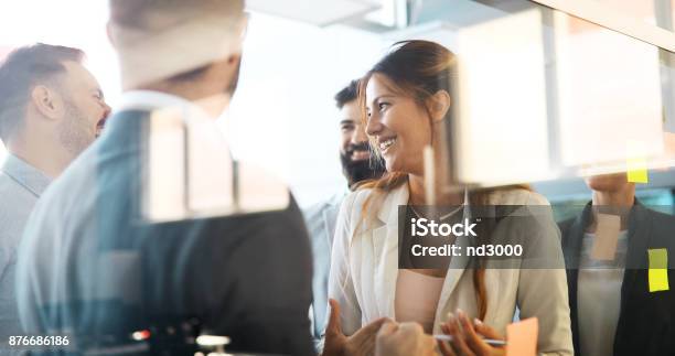 Collaboration And Analysis By Business People Working In Office Stock Photo - Download Image Now