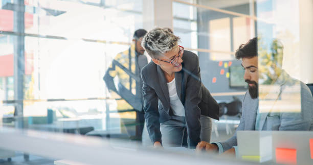 istock Business colleagues in conference room 876686386