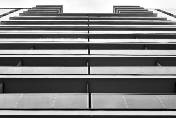 istock Modern apartment building.  Black and white. 876689702