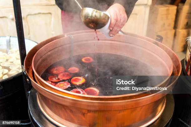 Pot Of Mulled Wine With Fruit And Spices Stock Photo - Download Image Now - Mulled Wine, Christmas Market, Heat - Temperature
