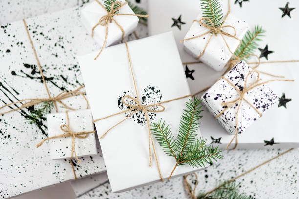 istock Christmas composition. Christmas gift and fir tree branches. Top view, flat lay 876694020