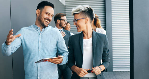 istock Business people having fun in office 876696636