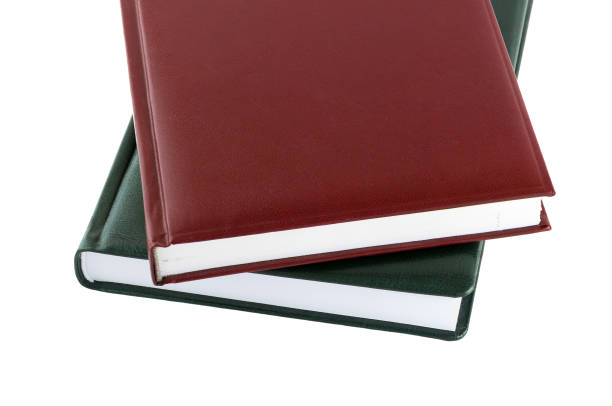 istock Book. Brown and green leather notebook isolated on white background. 876700252