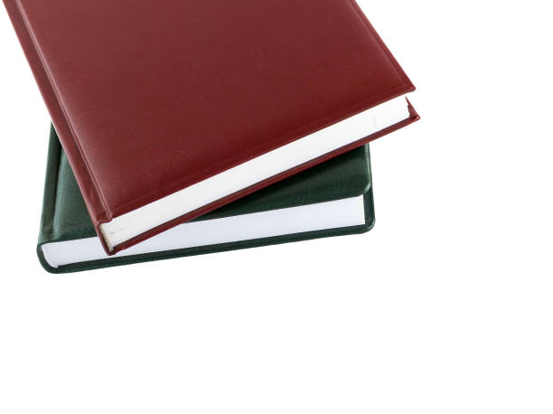istock Book. Brown and green leather notebook isolated on white background. 876700296