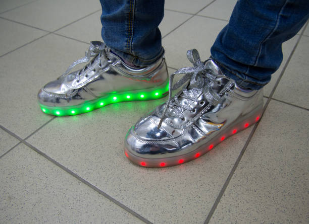 Squeak Have a picnic fascism Fashionable Sneakers With Led Lighting On The Legs Of People Stock Photo -  Download Image Now - iStock