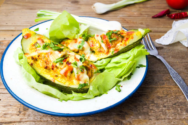 istock Stuffed eggplant with vegetables on a plate 876719350