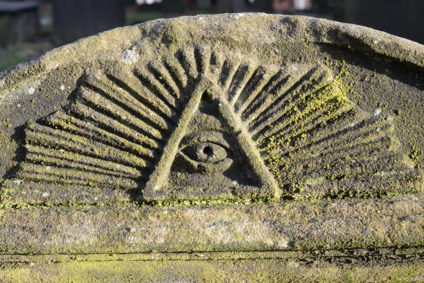 istock The All Seeing Eye engraved on a tombstone 876721748