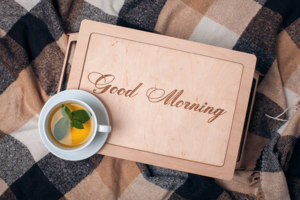 istock mockup with wooden table and tea; 876721904