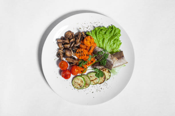 istock set with zucchini, mushrooms, fish, carrot and tomatoes; 876729684