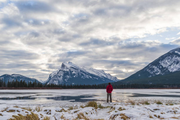 istock Lone traveler outdoors in winter 876734464
