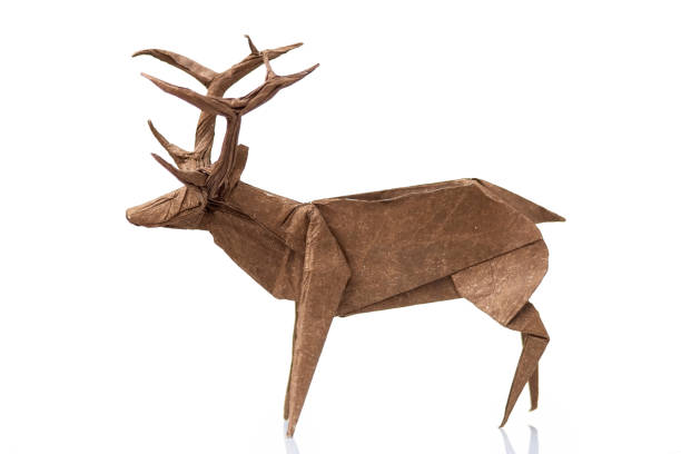 istock Origami reindeer design on white 876740726