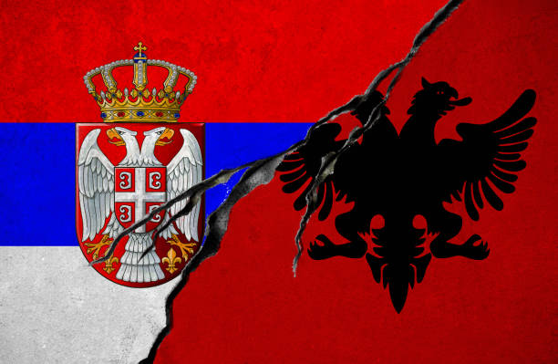 istock Serbian and Albanian flag, conflict concept 876740864