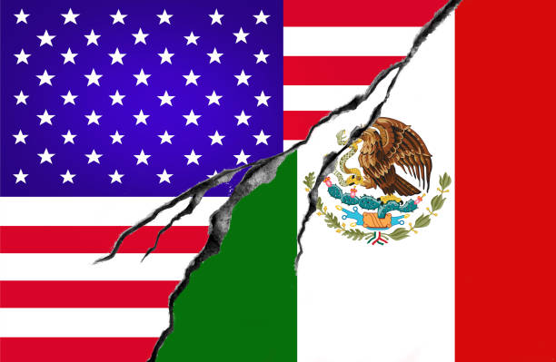 istock USA and Mexican flag, conflict concept 876741086