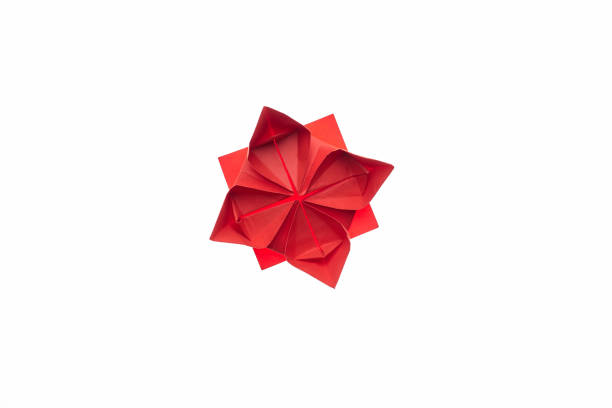 Close-up of origami cube in different colors with spikes against white background. Photo taken February 26th, 2025, Zurich, Switzerland.