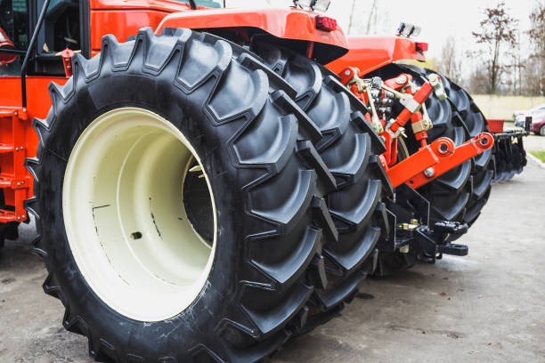 istock Modern Tractor Big Wheels close up, Modern Agricultural Generic Vehicle 876748012
