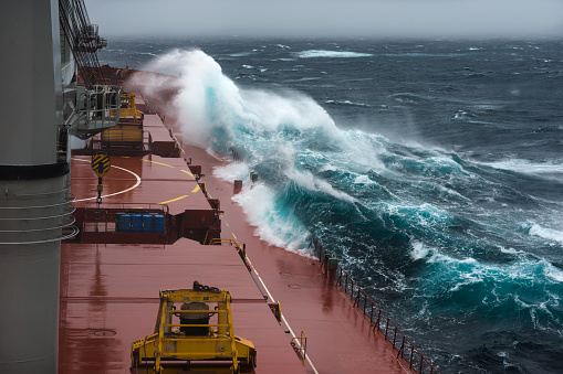 Cargo ship at storm