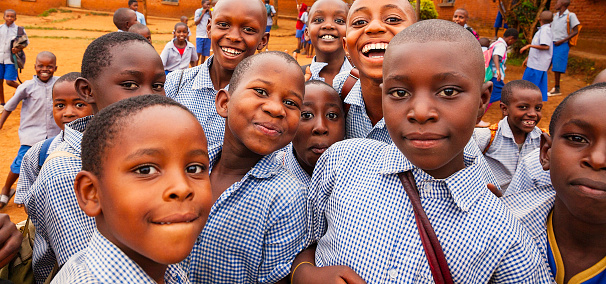 Kigali, Rwanda- May 2017- Smiling group of elementary school kids in school uniform, Kigali, Rwanda