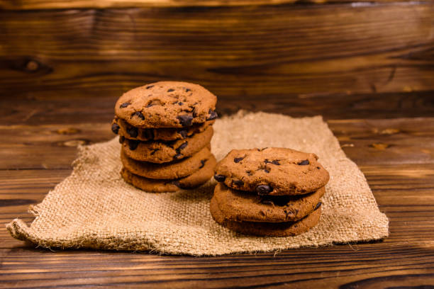 istock Chocolate chip cookies on sackcloth on a wooden table 876783700