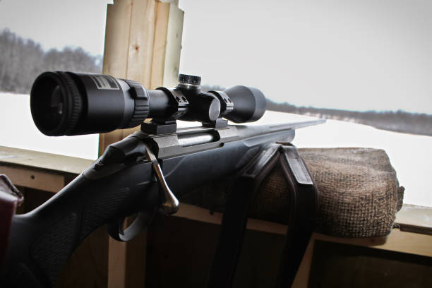 istock Closeup of a rifle bolt and scope while hunting 876784594
