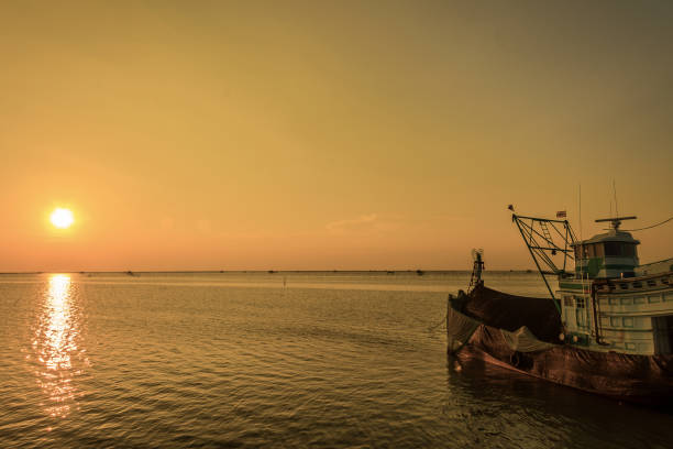 istock fishing boat in twilight time  ,  Thailand 876787266
