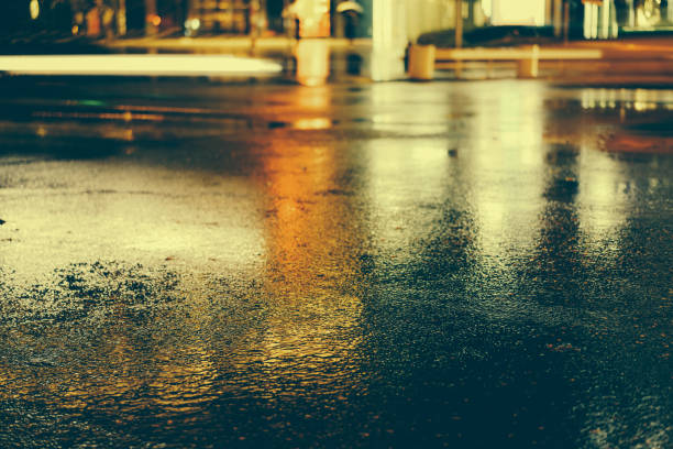 istock Rainy night in the big city 876787874
