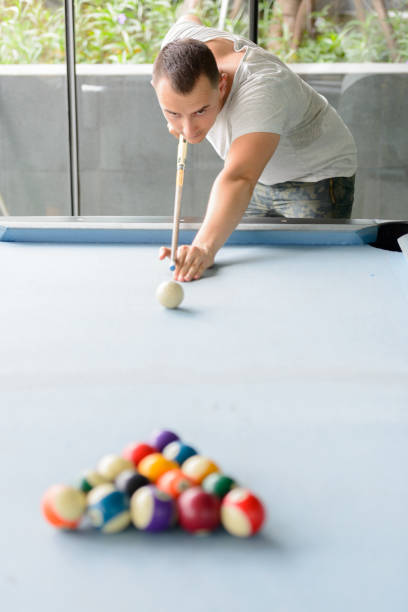 istock Handsome man enjoying life while relaxing at home 876792472