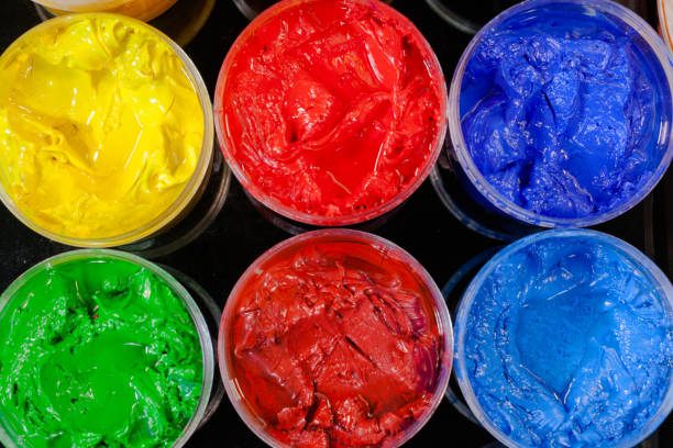 istock top view of Plastisol ink in white plastic cans 876816374