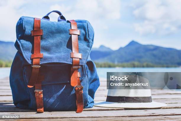 Traveler Backpack And Hat Travel Background With Copy Space Stock Photo - Download Image Now